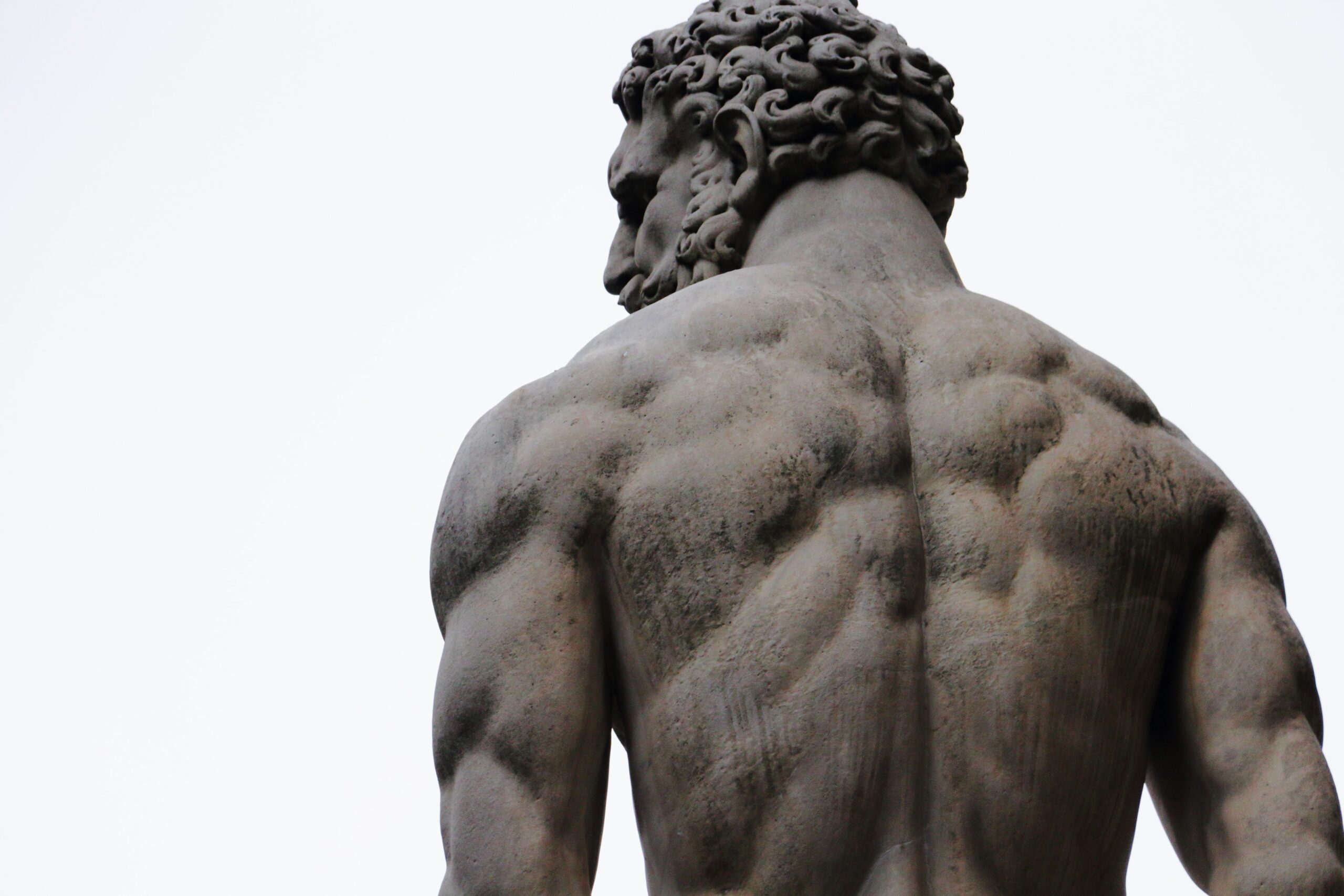Statute of stoic muscular back physique